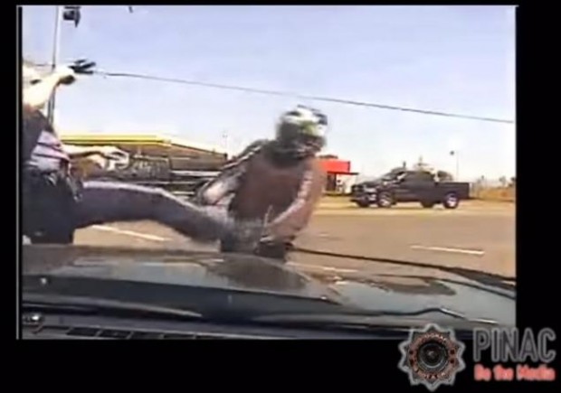 Oregon motorcyclist kicked by cop awarded $180G to settle excessive force claim