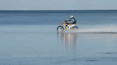 Like Riding Motorcycles and Surfing? Watch Robbie Maddison do both at the same time!