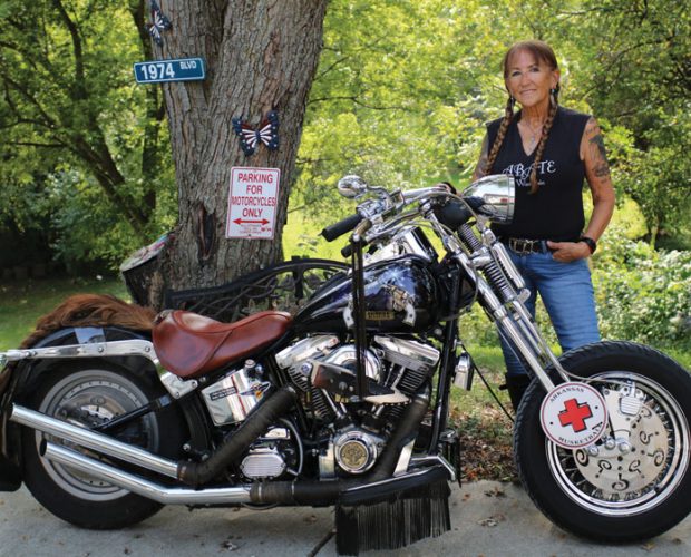 Hall of Famer Vicki “Spitfire” Sanfelipo And Trigger, her 1993 Harley Softail